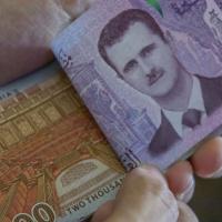 Банк Сирії девальвував національну валюту